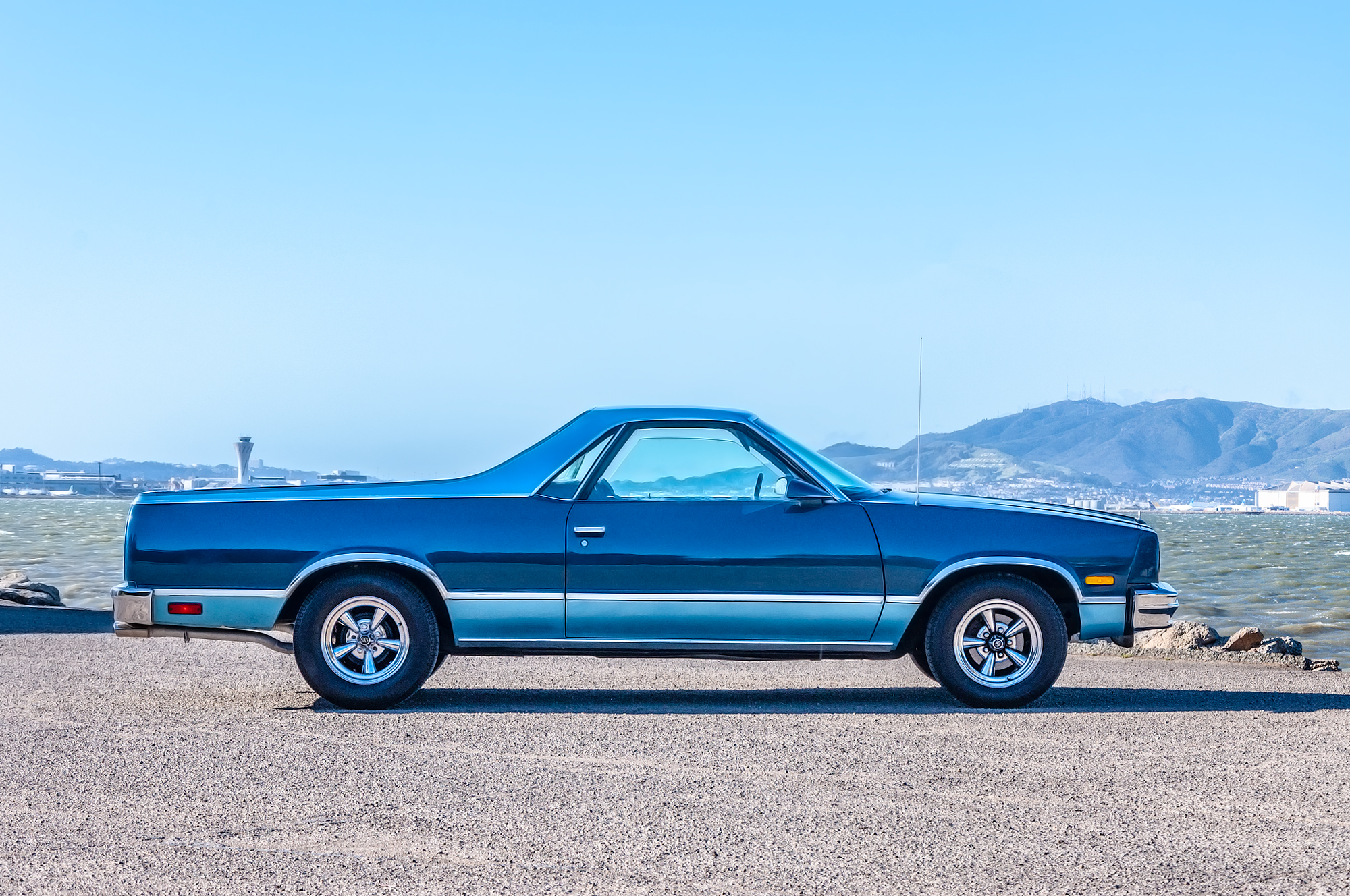 Side profile view 1986 Chevrolet El Camino Conquista in custom two tone blue color scheme